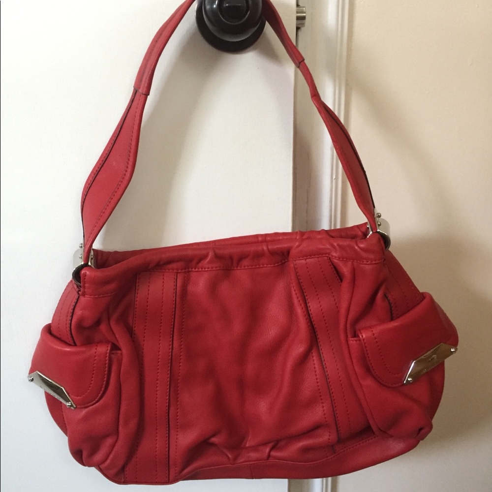 B. Makowsky red satchel
